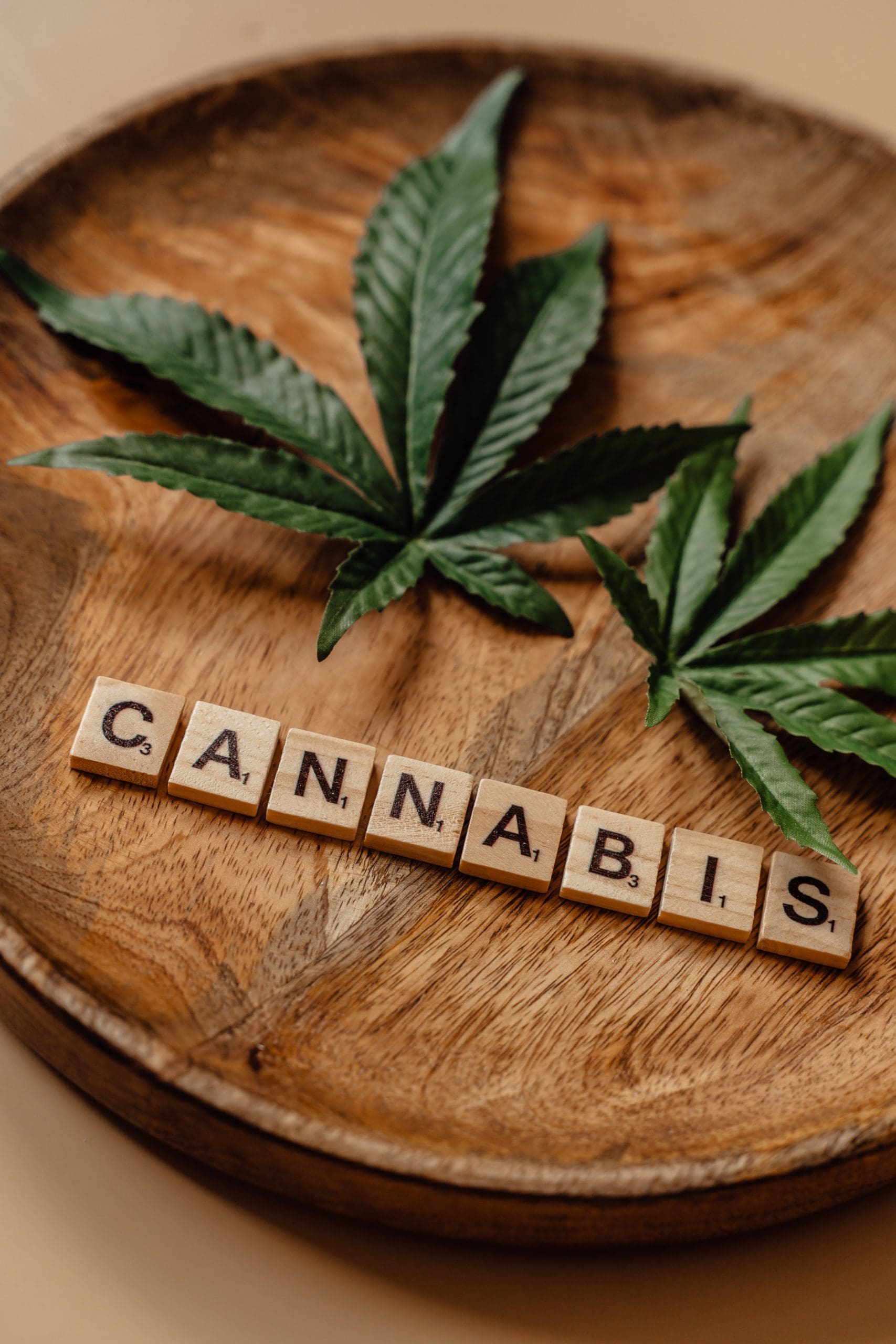 cannabis-scrabbleletters Cannabis leaves with cannabis spelled out in scrabble letters